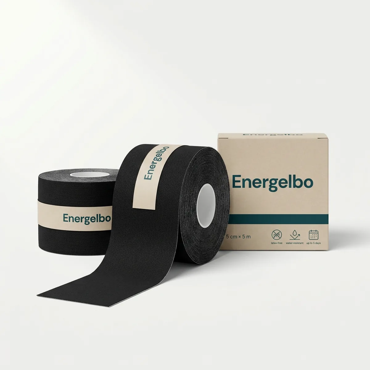 Wide 7.5 cm black Energelbo tape roll standing in front of a standard 5 cm roll to show the difference in width